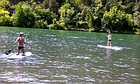 Paddle boarding the river
